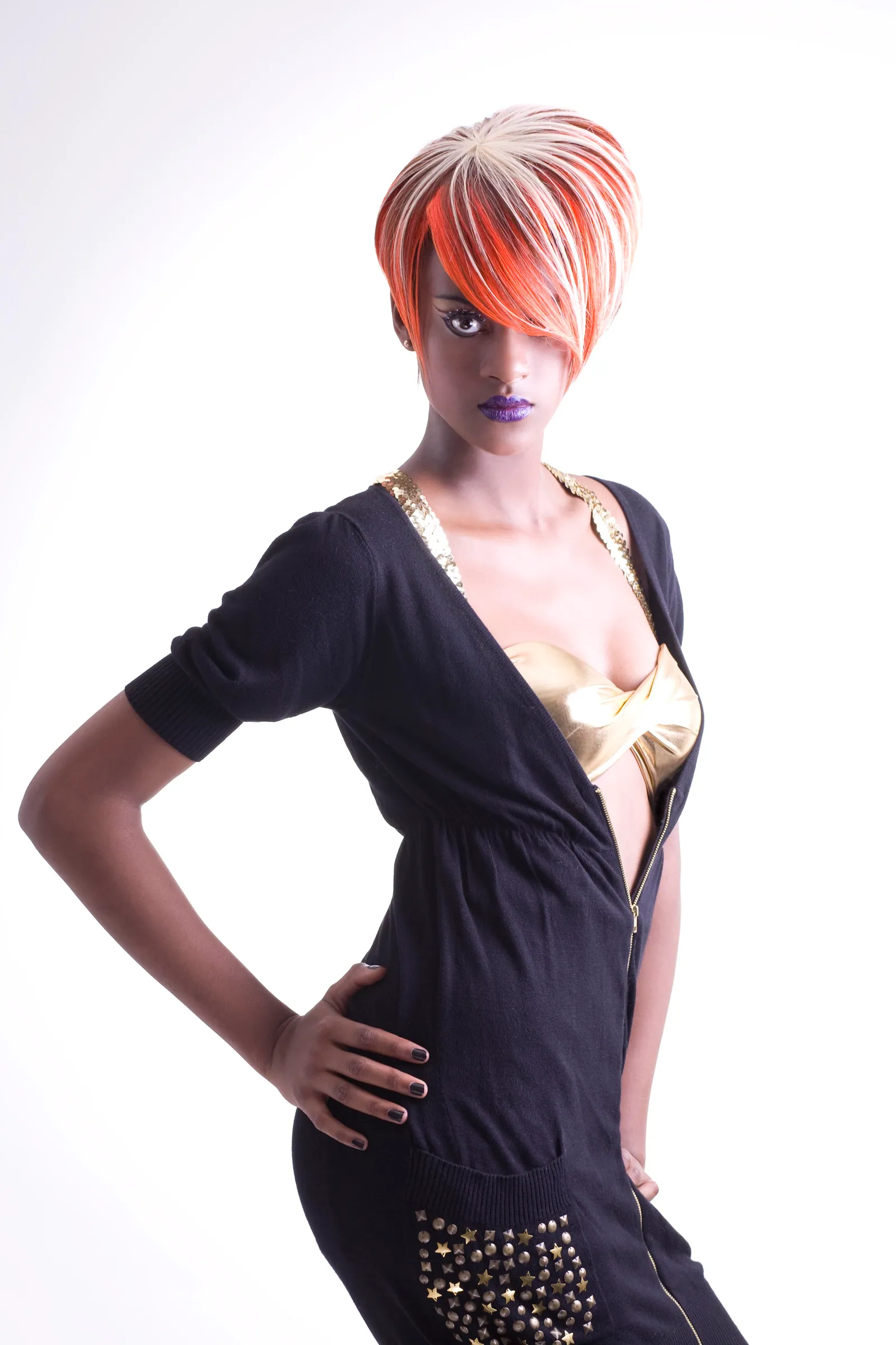 Short copper and white crop, shown full length with a black jumpsuit