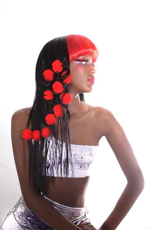 Long, sleek black weave with a red fringe panel and red rosettes set through the lengths